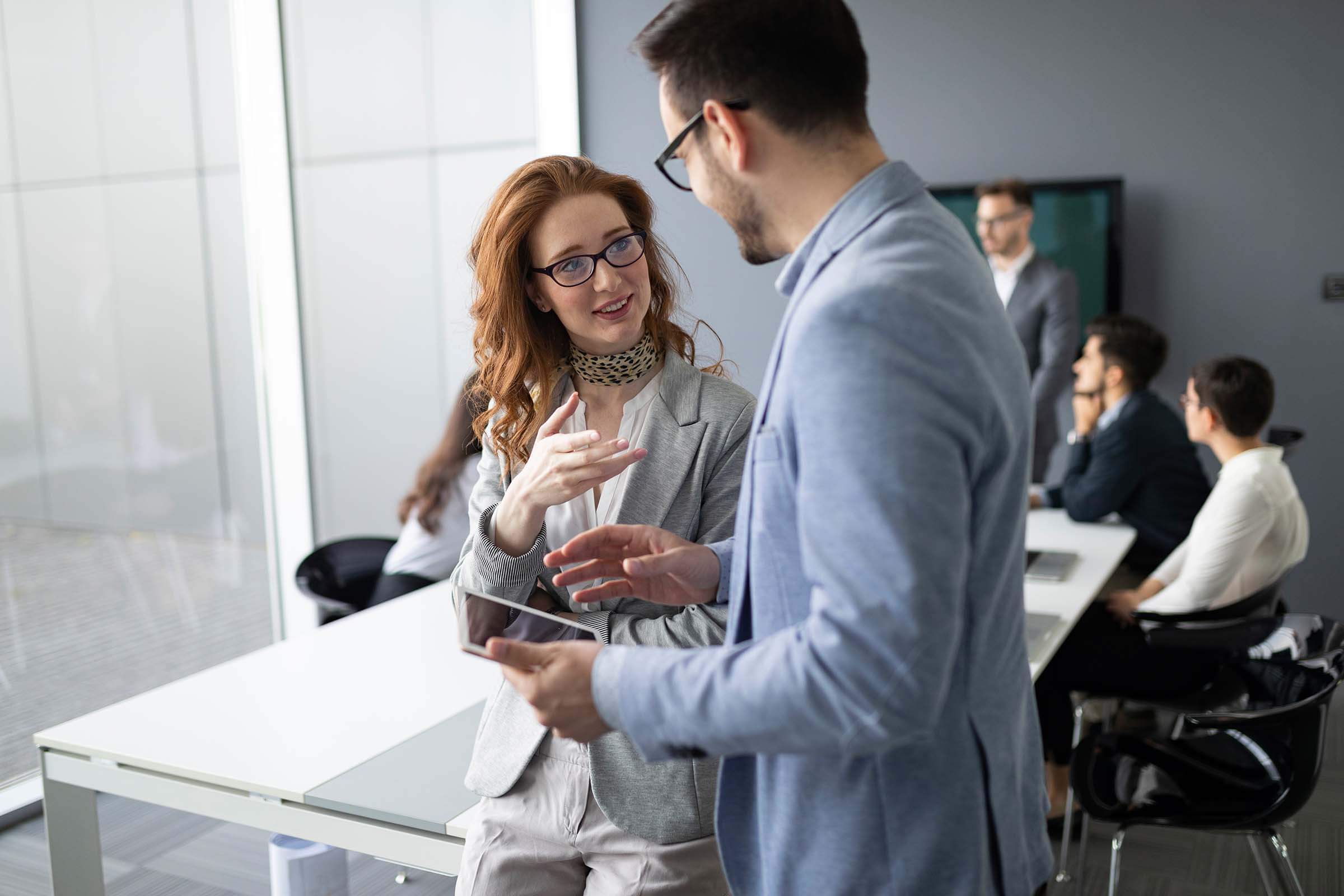 Group-Of-Lawyers-Discussing-Contract-Together